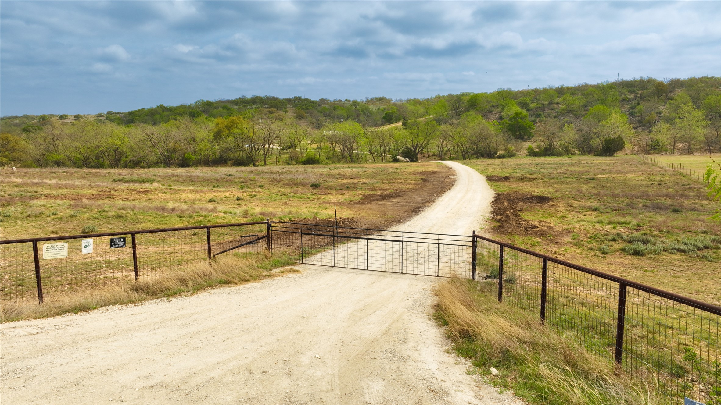 6980 Doss-Spring Creek Road Fredericksburg, TX 78624 - Photo 14 of 20 Entry gate to property located conveniently off of Doss Spring Creek Road.