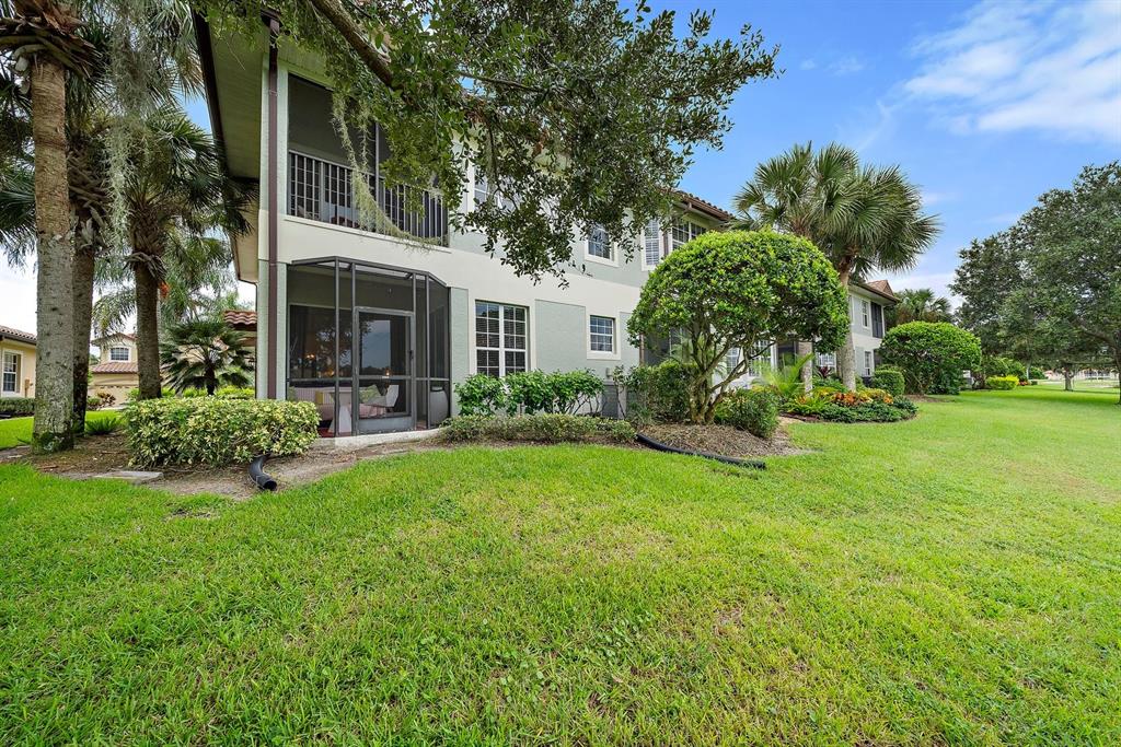 8406 Miramar Way, Unit 8406 Lakewood Ranch, FL 34202 - Photo 15 of 31 a view of backyard of house with green space