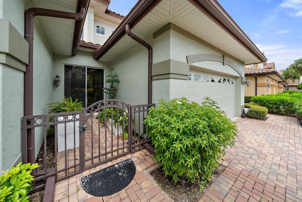 8406 Miramar Way, Unit 8406 Lakewood Ranch, FL 34202 - Photo 31 of 31 a view of a house with potted plants