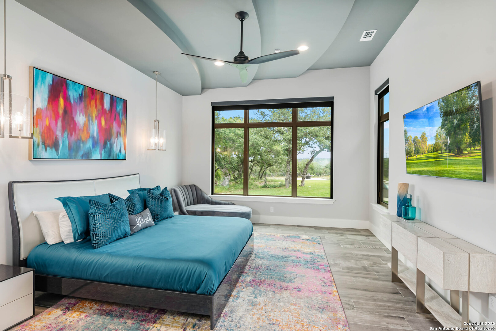 815 Brand Road Bulverde, TX 78163 - Photo 15 of 50 a living room with furniture and a flat screen tv