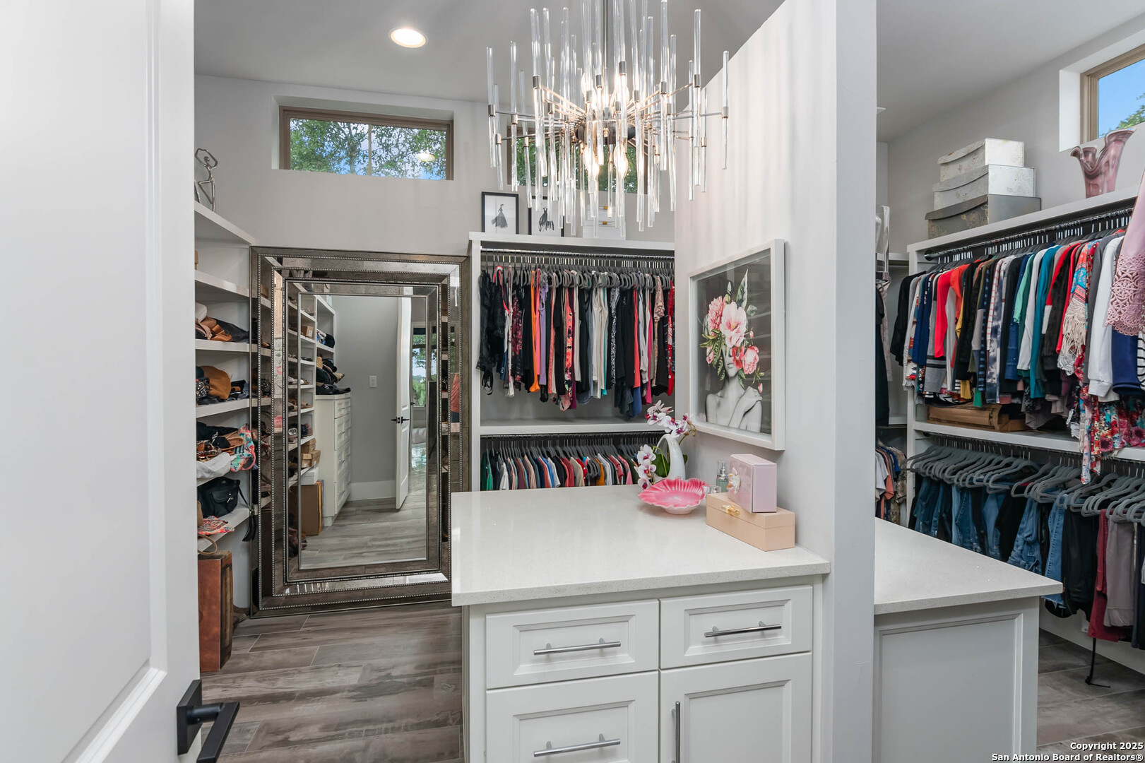 815 Brand Road Bulverde, TX 78163 - Photo 18 of 50 a view of walk in closet with clothes and shoes