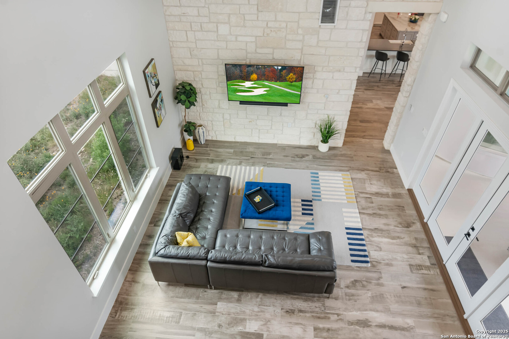 815 Brand Road Bulverde, TX 78163 - Photo 29 of 50 a living room with furniture and a fireplace