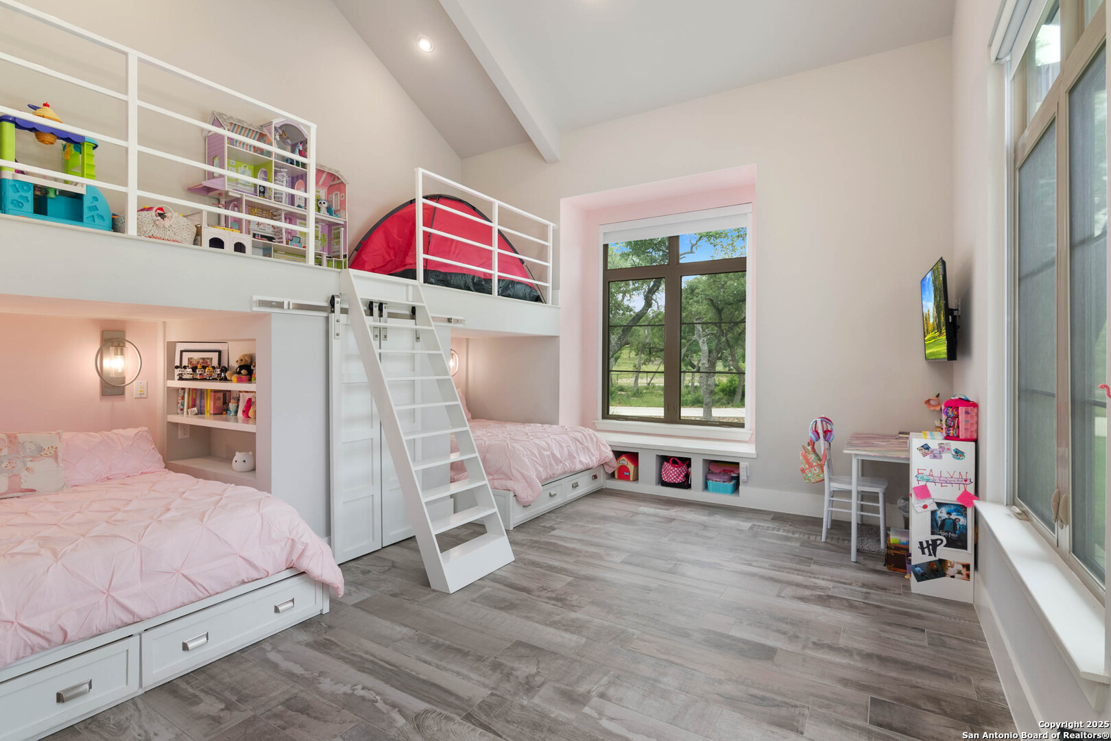 815 Brand Road Bulverde, TX 78163 - Photo 32 of 50 a bedroom with a bed and a window