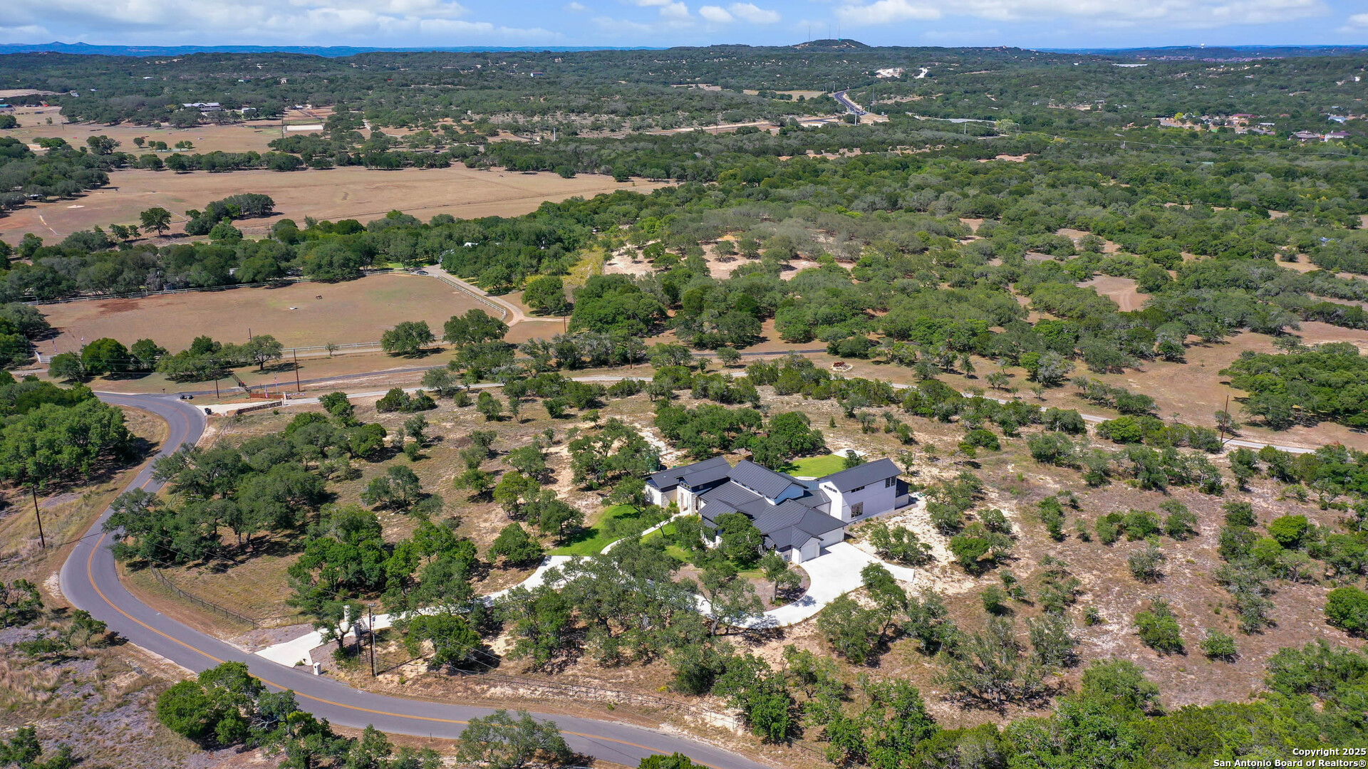 815 Brand Road Bulverde, TX 78163 - Photo 47 of 50 an aerial view of residential houses with outdoor space and trees