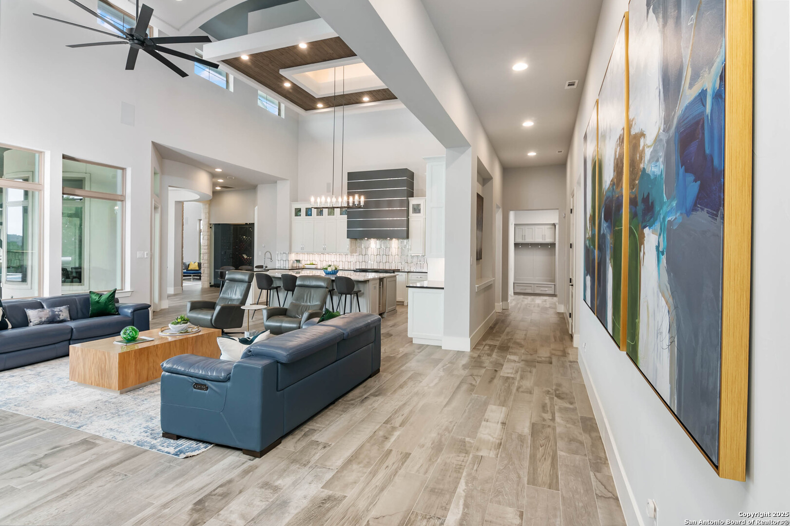 815 Brand Road Bulverde, TX 78163 - Photo 6 of 50 a living room with furniture and a wooden floor
