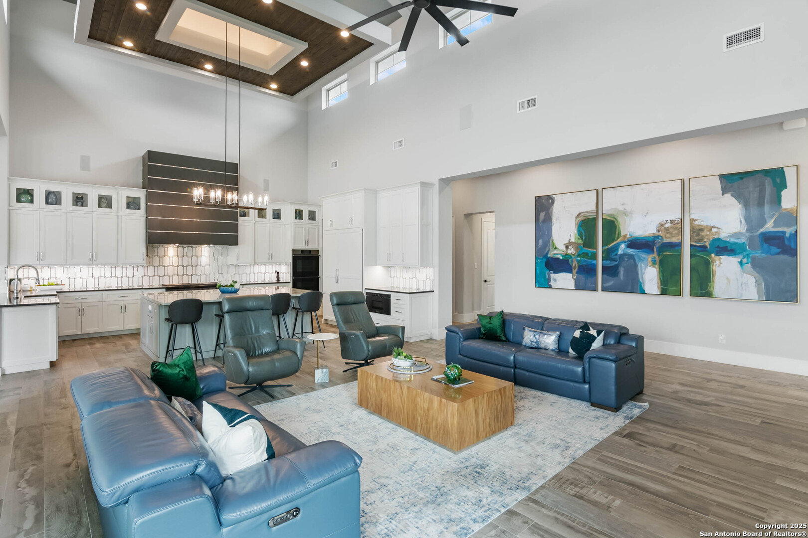 815 Brand Road Bulverde, TX 78163 - Photo 8 of 50 a living room with furniture and a flat screen tv