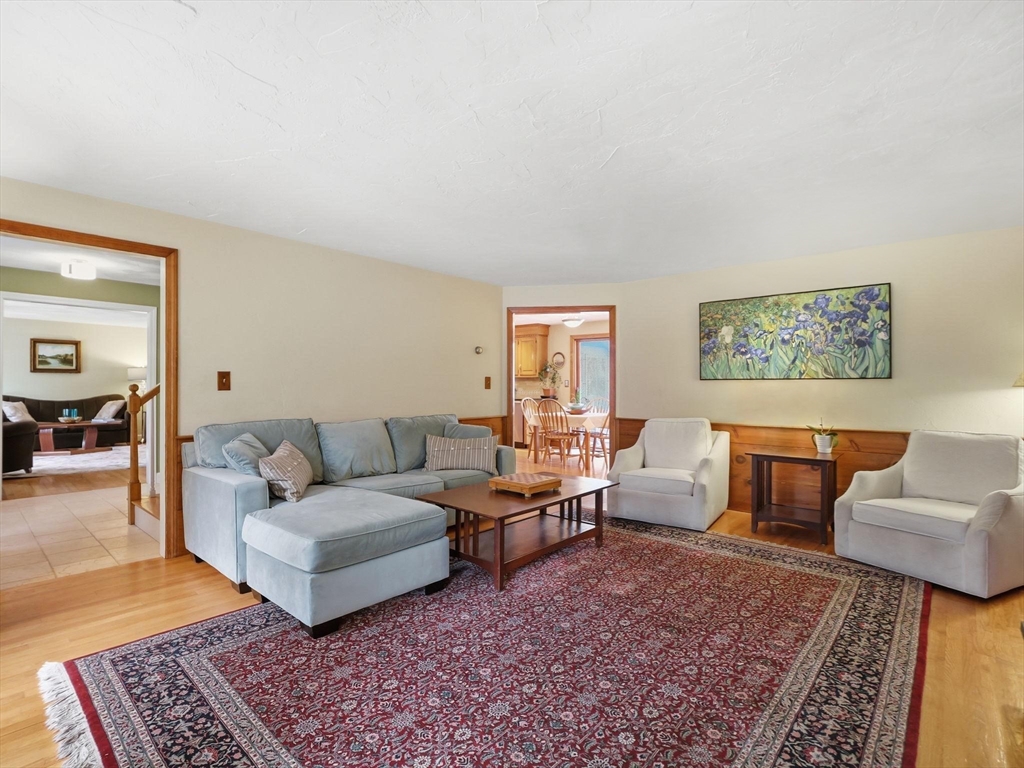 10 Berkeley Lane Andover, MA 01810 - Photo 13 of 42 a living room with furniture and a rug