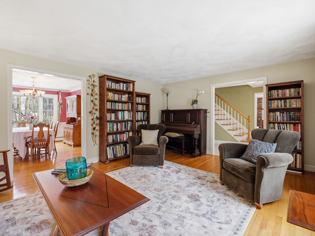 10 Berkeley Lane Andover, MA 01810 - Photo 16 of 42 a living room with furniture and a wooden floor
