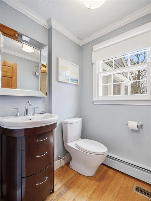 10 Berkeley Lane Andover, MA 01810 - Photo 20 of 42 a bathroom with a granite countertop toilet sink and mirror