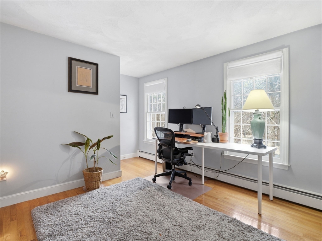 10 Berkeley Lane Andover, MA 01810 - Photo 28 of 42 a view of a livingroom with workspace and a window