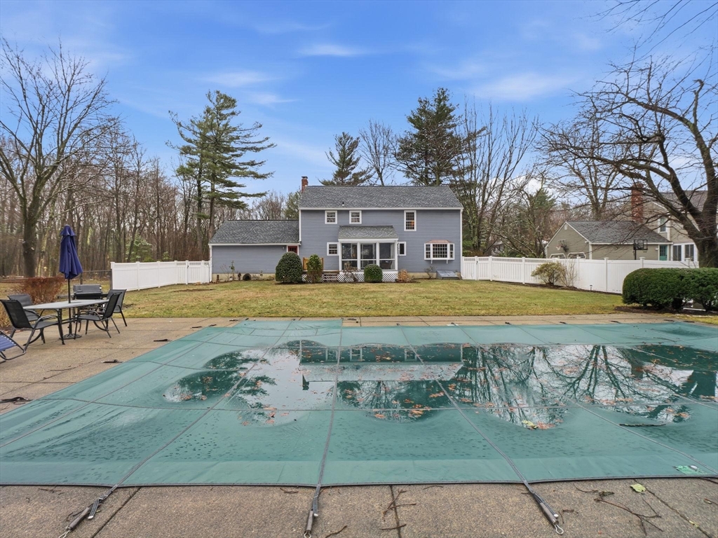 10 Berkeley Lane Andover, MA 01810 - Photo 3 of 42 a view of a house with swimming pool
