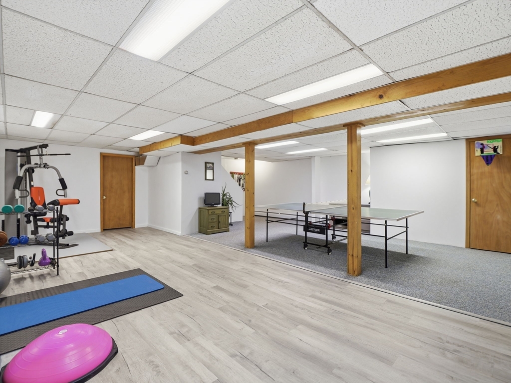 10 Berkeley Lane Andover, MA 01810 - Photo 36 of 42 a view of a room with gym equipment