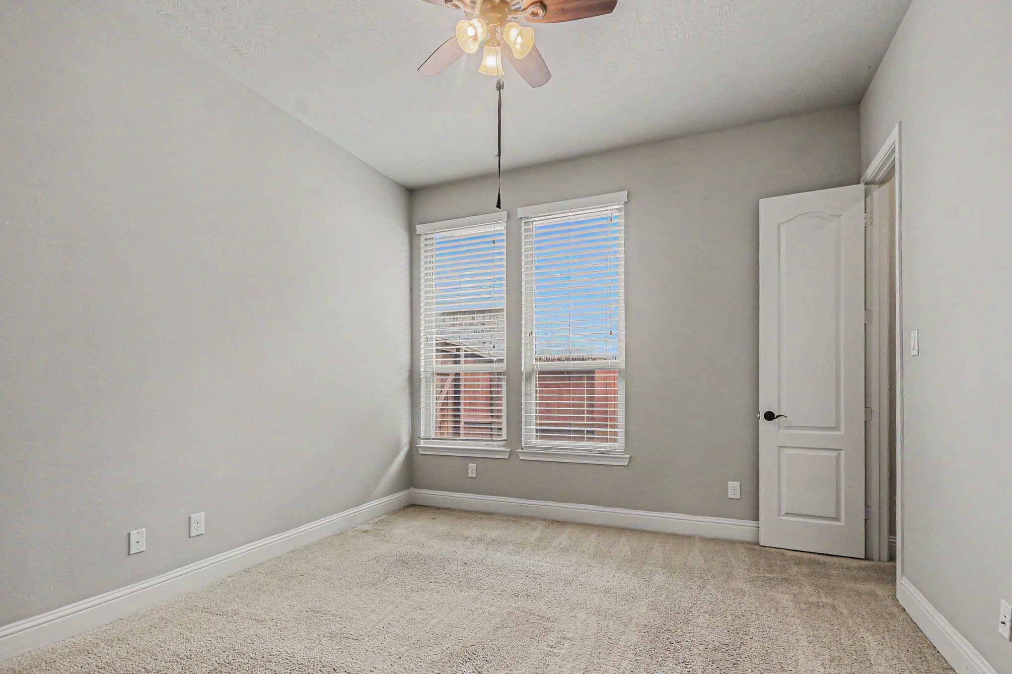3310 Ralston Edge Lane Houston, TX 77059 - Photo 32 of 50 a view of an empty room with a window