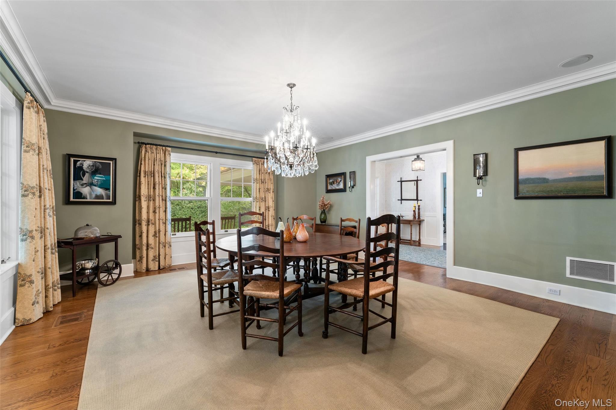 65 Garden Road Scarsdale, NY 10583 - Photo 16 of 48 a view of a dining room with furniture window and wooden floor