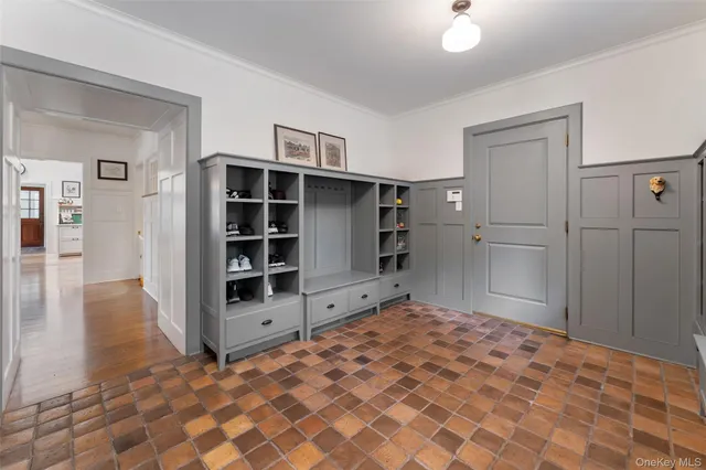 a bathroom with a bathtub and a window