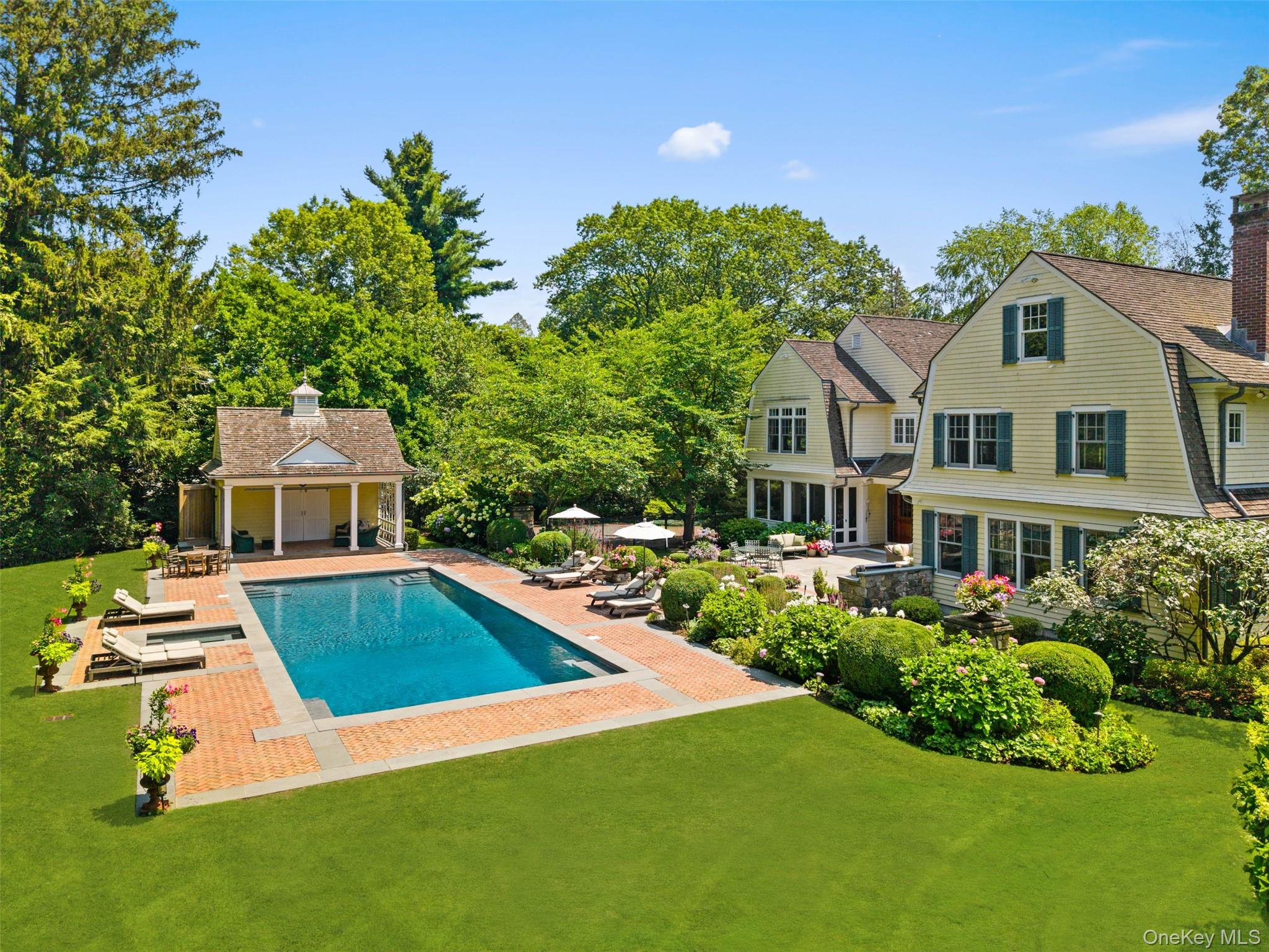 65 Garden Road Scarsdale, NY 10583 - Photo 3 of 48 a view of a house with pool