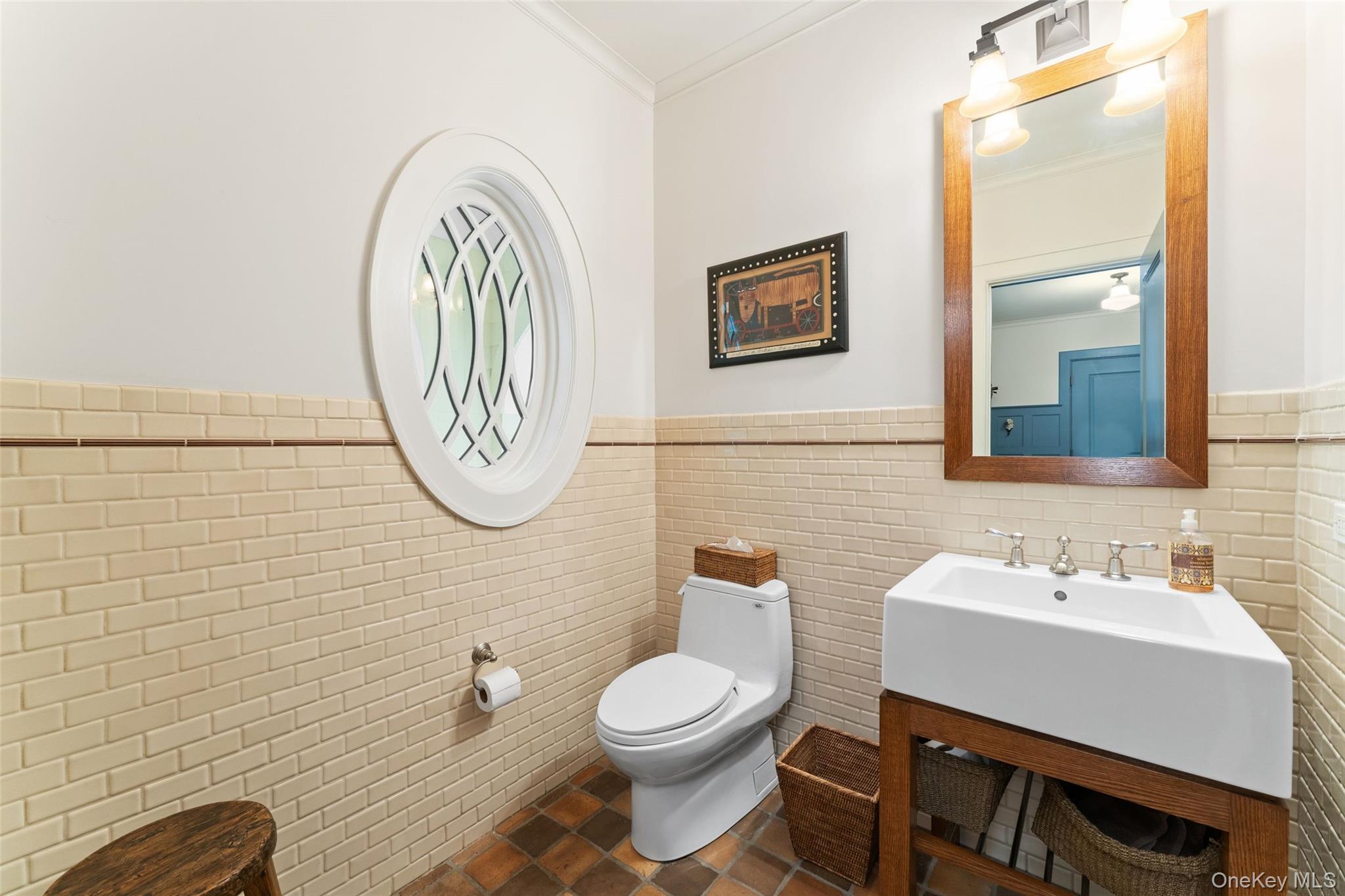 65 Garden Road Scarsdale, NY 10583 - Photo 31 of 48 a bathroom with a toilet a sink and mirror