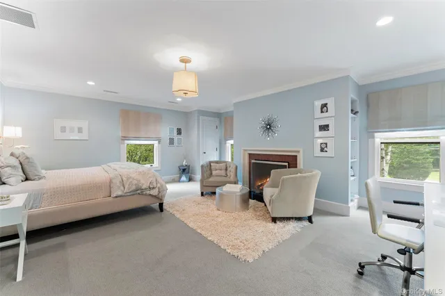 a bedroom with a bed and a couch