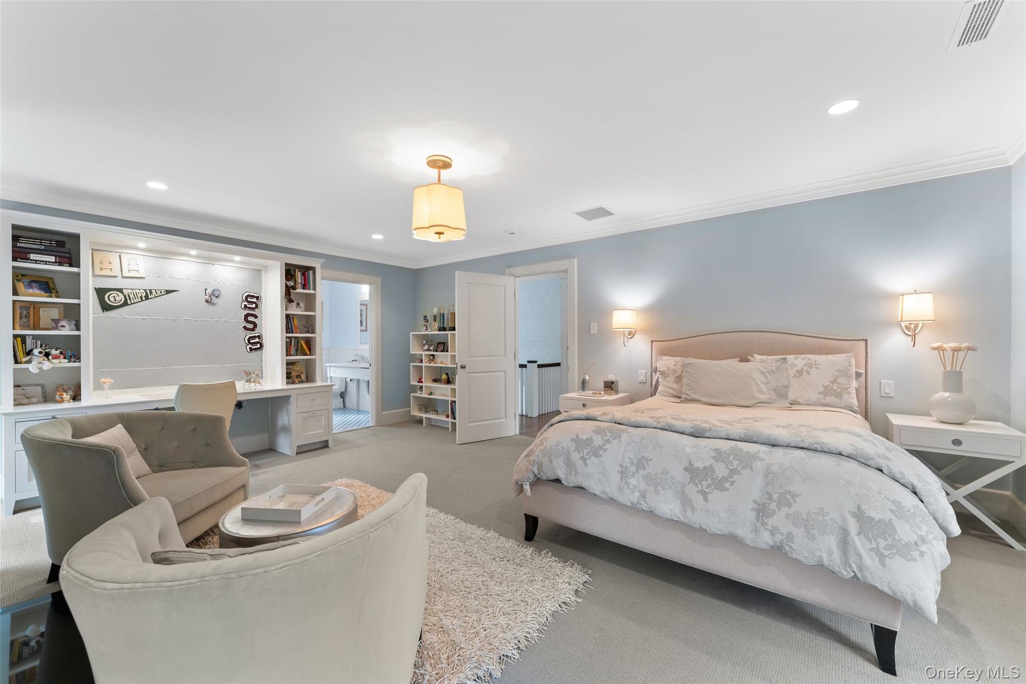 65 Garden Road Scarsdale, NY 10583 - Photo 38 of 48 a bedroom with a bed and a couch