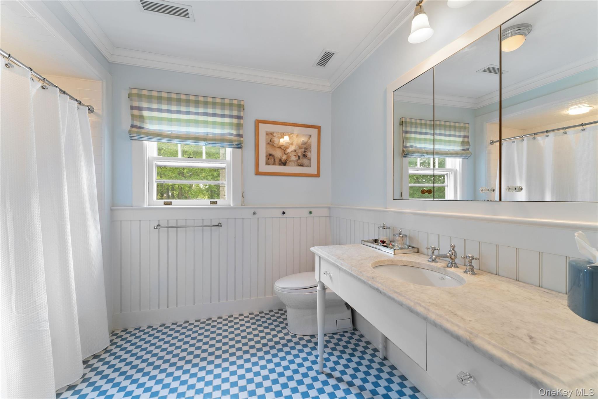 65 Garden Road Scarsdale, NY 10583 - Photo 39 of 48 a bathroom with a granite countertop sink a mirror a toilet and a window