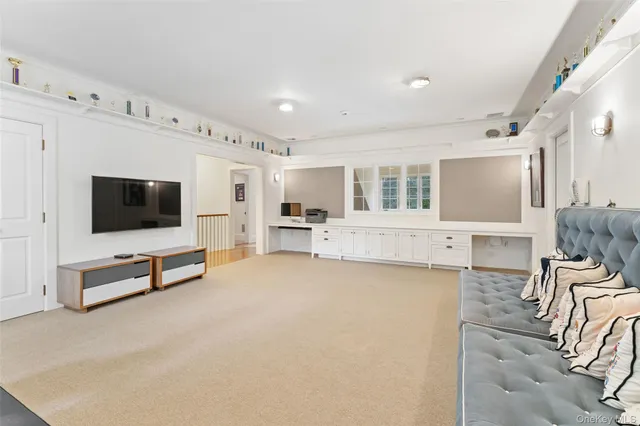 a bed room with a bed and a large window