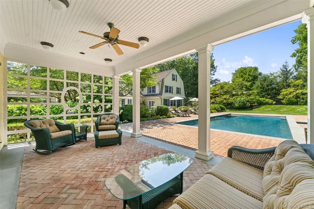 a view of a big yard with a large trees