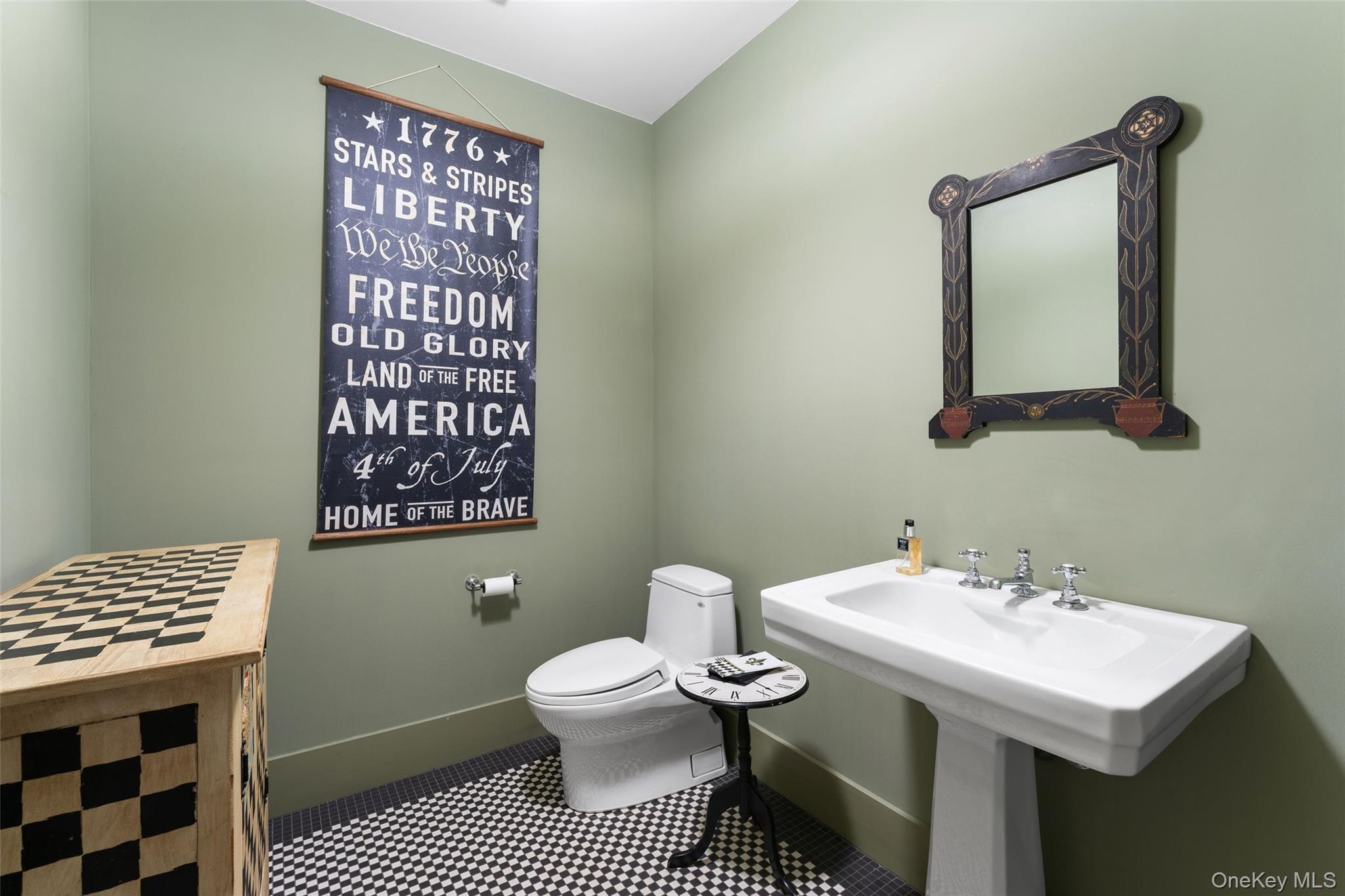 65 Garden Road Scarsdale, NY 10583 - Photo 48 of 48 a bathroom with a sink a toilet and a mirror