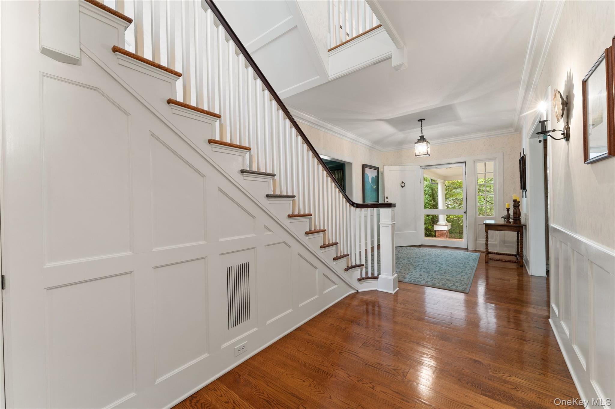 65 Garden Road Scarsdale, NY 10583 - Photo 10 of 48 a view of entryway and hall with wooden floor