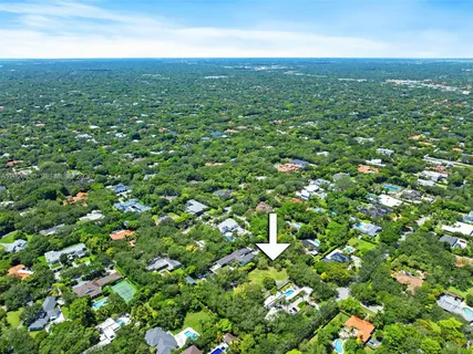 a view of a big yard with and trees