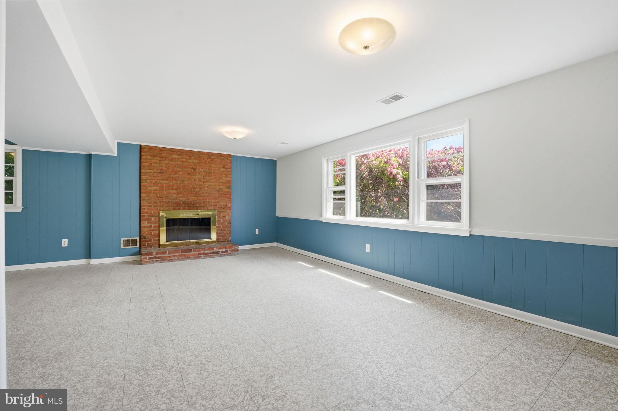 12106 Ruffin Drive Fairfax, VA 22030 - Photo 28 of 41 Lower Level Family Room w/wood burning fireplace