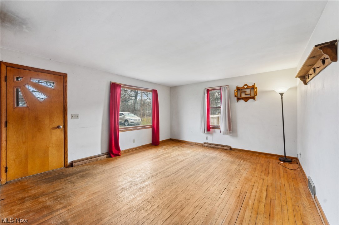 1470 Collar Price Road Hubbard, OH 44425 - Photo 11 of 23 Unfurnished room with light hardwood / wood-style flooring