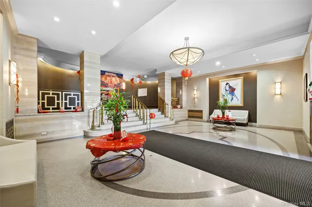 a room with gym equipment and large windows