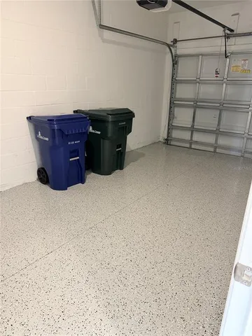 a kitchen with stainless steel appliances granite countertop a sink and a stove