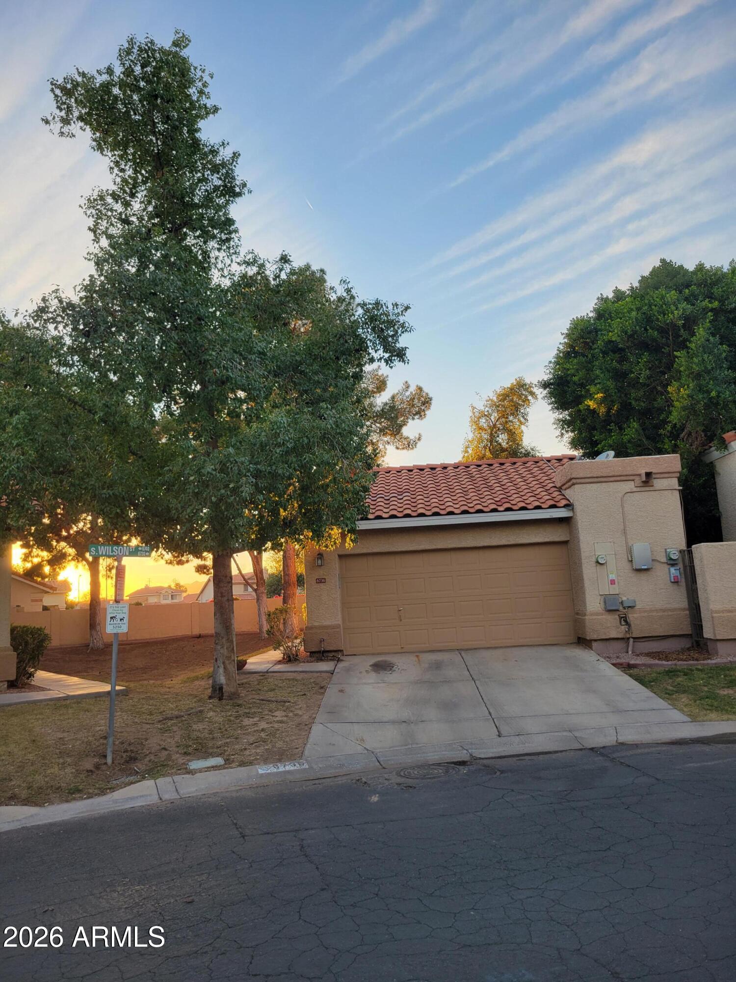 6736 South Wilson Street Tempe, AZ 85283 - Photo 2 of 13 a view of a house with a street