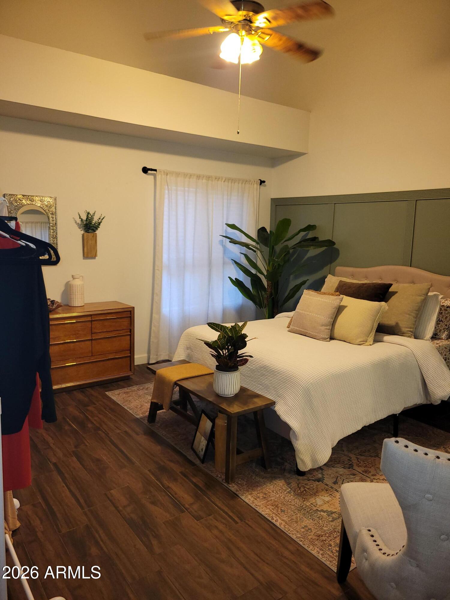 6736 South Wilson Street Tempe, AZ 85283 - Photo 4 of 13 a bedroom with bed and window