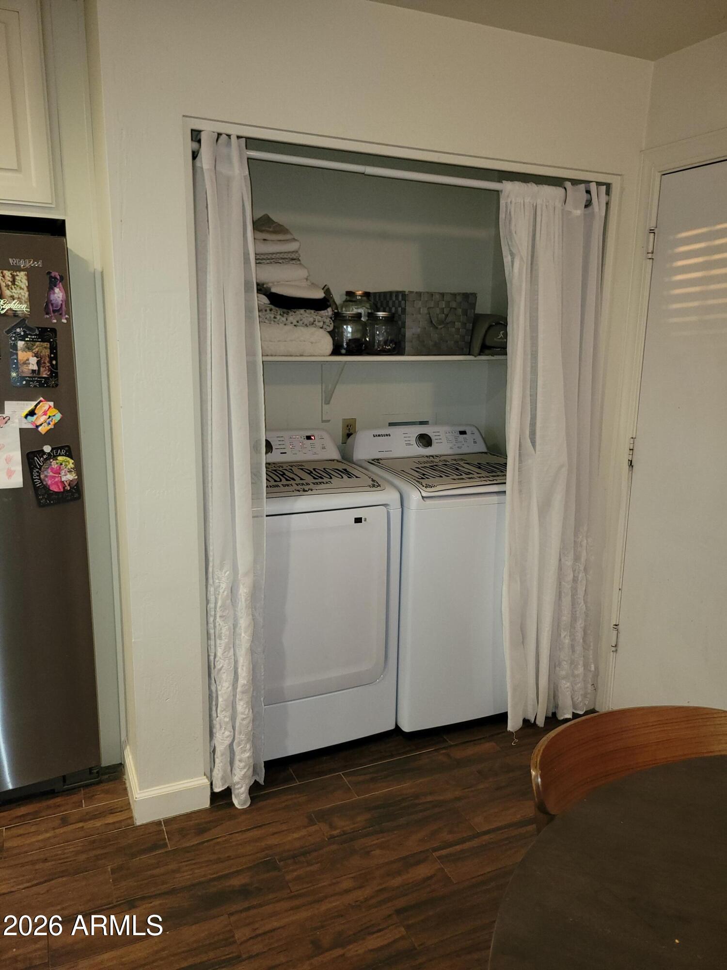 6736 South Wilson Street Tempe, AZ 85283 - Photo 9 of 13 a view of walk in closet with empty racks