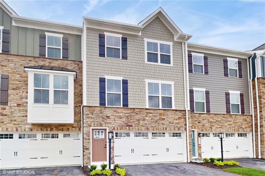 6804 Sycamore Way Gibsonia, PA 15044 - Photo 2 of 50 a front view of a building with a street