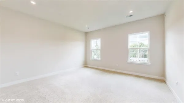 an empty room with an entryway door