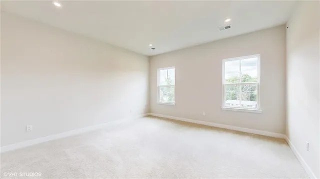 an empty room with an entryway door