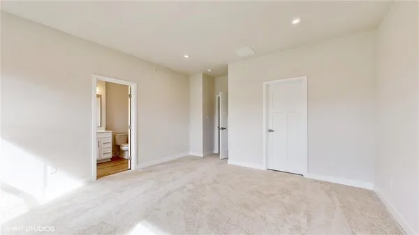a bathroom with a sink a vanity and a bathtub