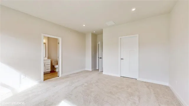 a bathroom with a sink a vanity and a bathtub