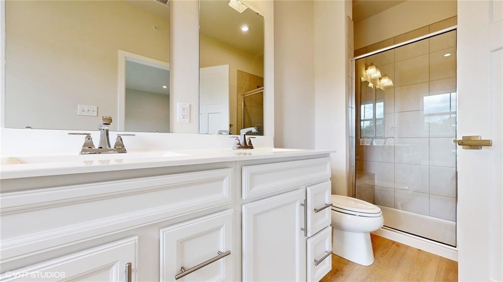 6804 Sycamore Way Gibsonia, PA 15044 - Photo 27 of 50 a bathroom with a sink and a mirror