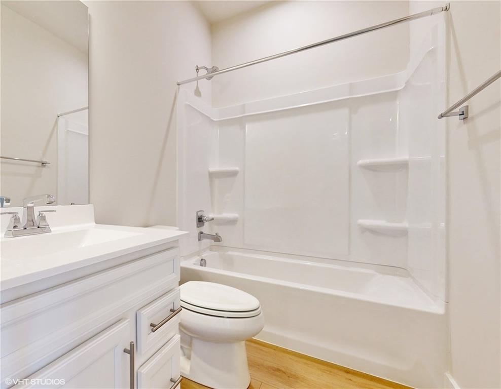 6804 Sycamore Way Gibsonia, PA 15044 - Photo 29 of 50 a bathroom with a sink a toilet and a bathtub