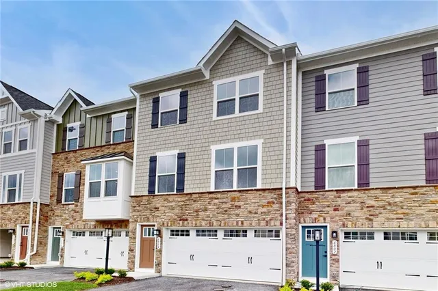 a view of building with glass windows