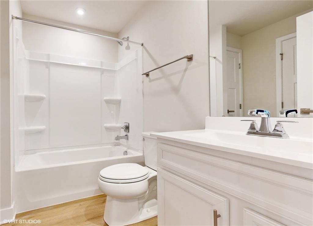 6804 Sycamore Way Gibsonia, PA 15044 - Photo 39 of 50 a bathroom with a bathtub shower sink vanity and toilet