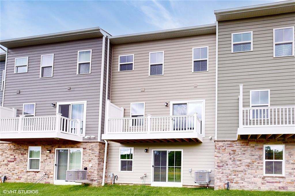 6804 Sycamore Way Gibsonia, PA 15044 - Photo 43 of 50 a front view of a brick house with a yard