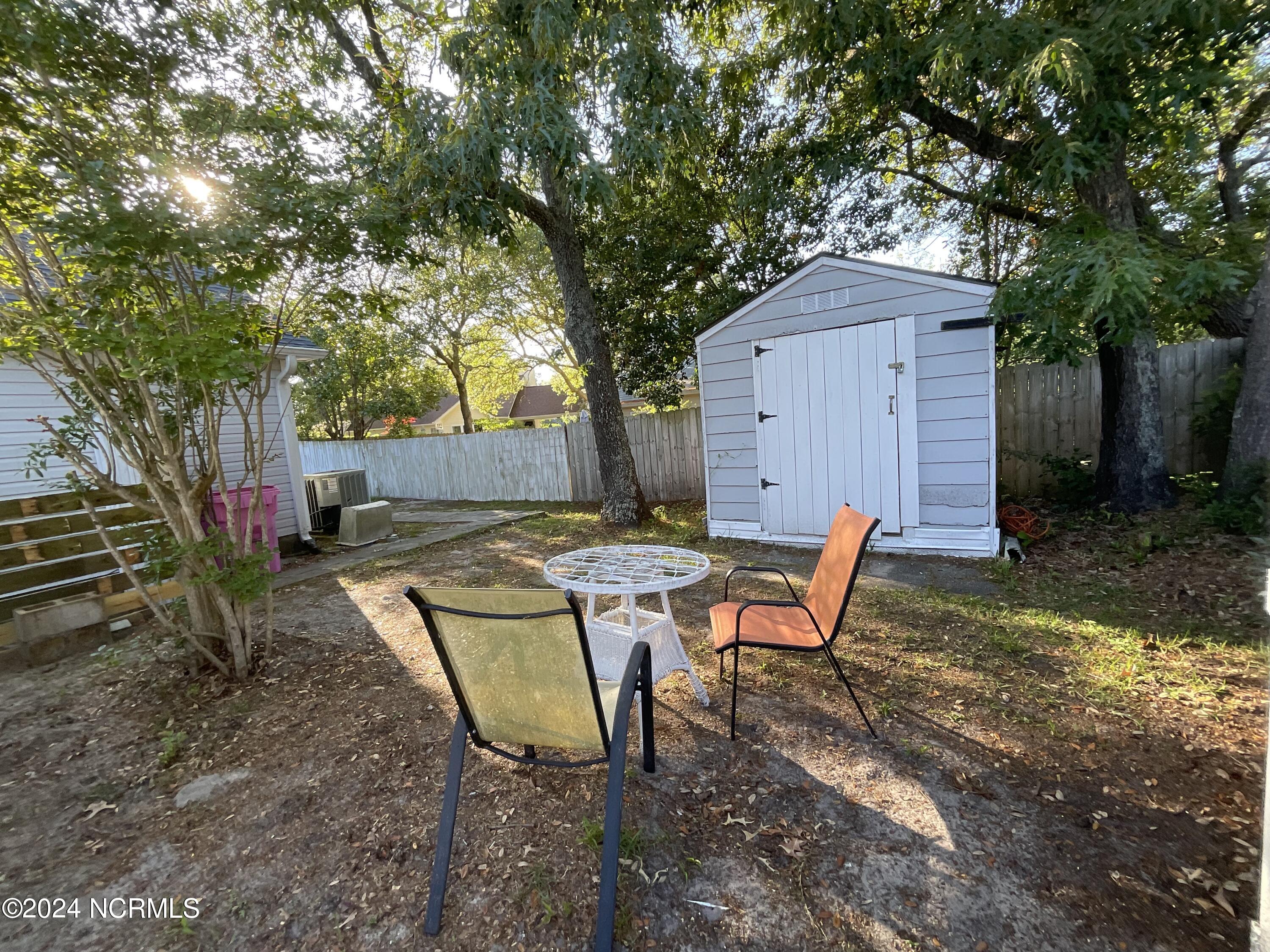 1405 Faulkenberry Road Wilmington, NC 28409 - Photo 21 of 29 Shed and court yard