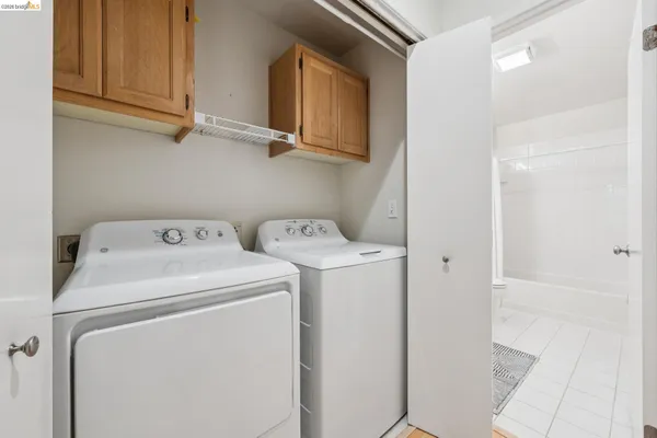 a kitchen with granite countertop a stove and a microwave