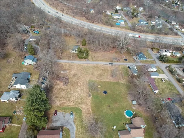 an aerial view of a residential houses