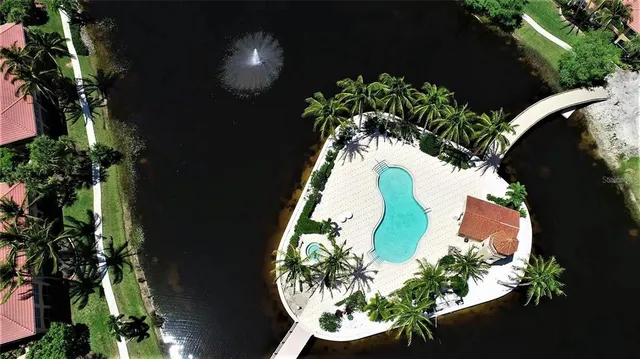 a view of a kitchen with a sink and cabinets
